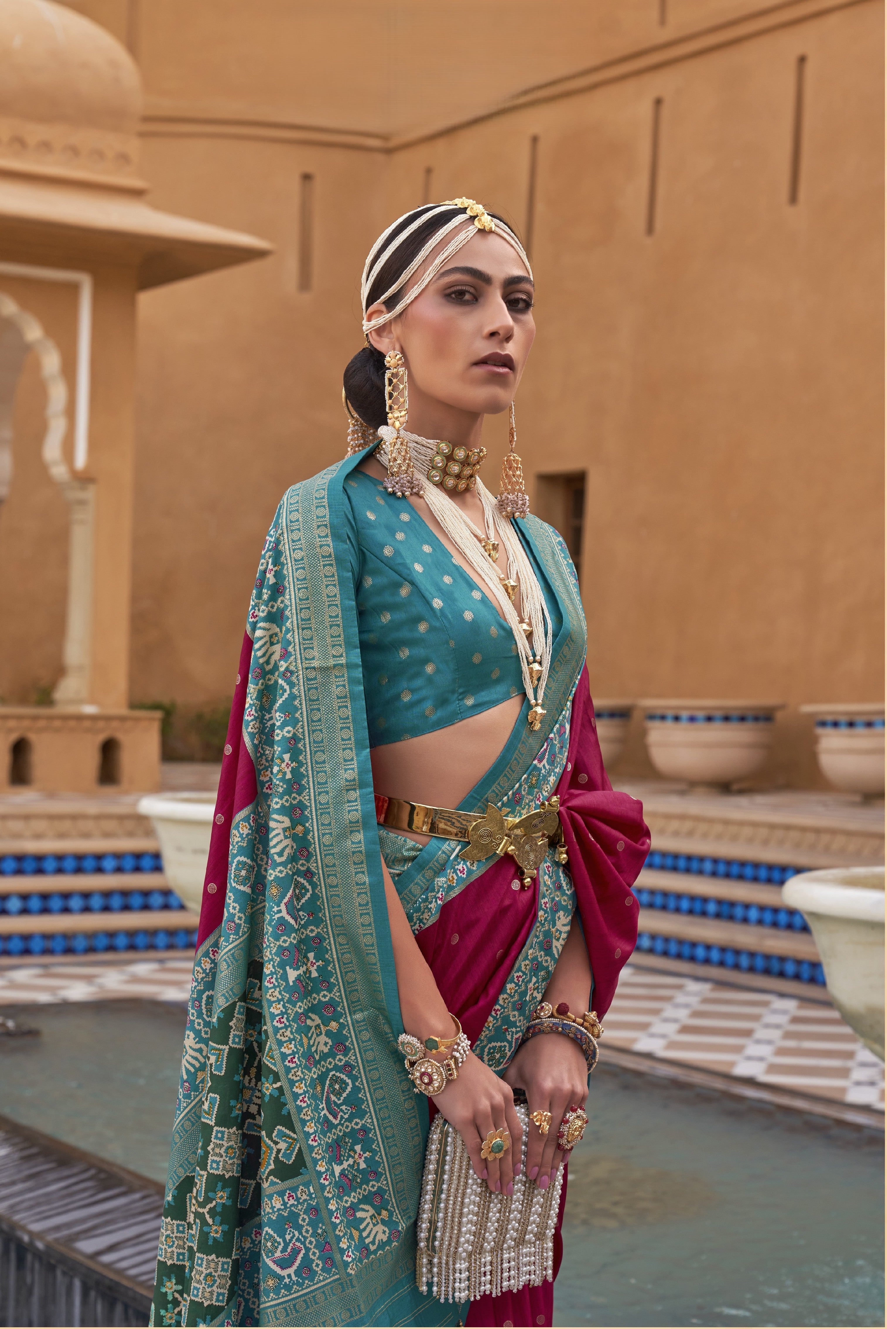 Teal Silk Saree With Patola Border