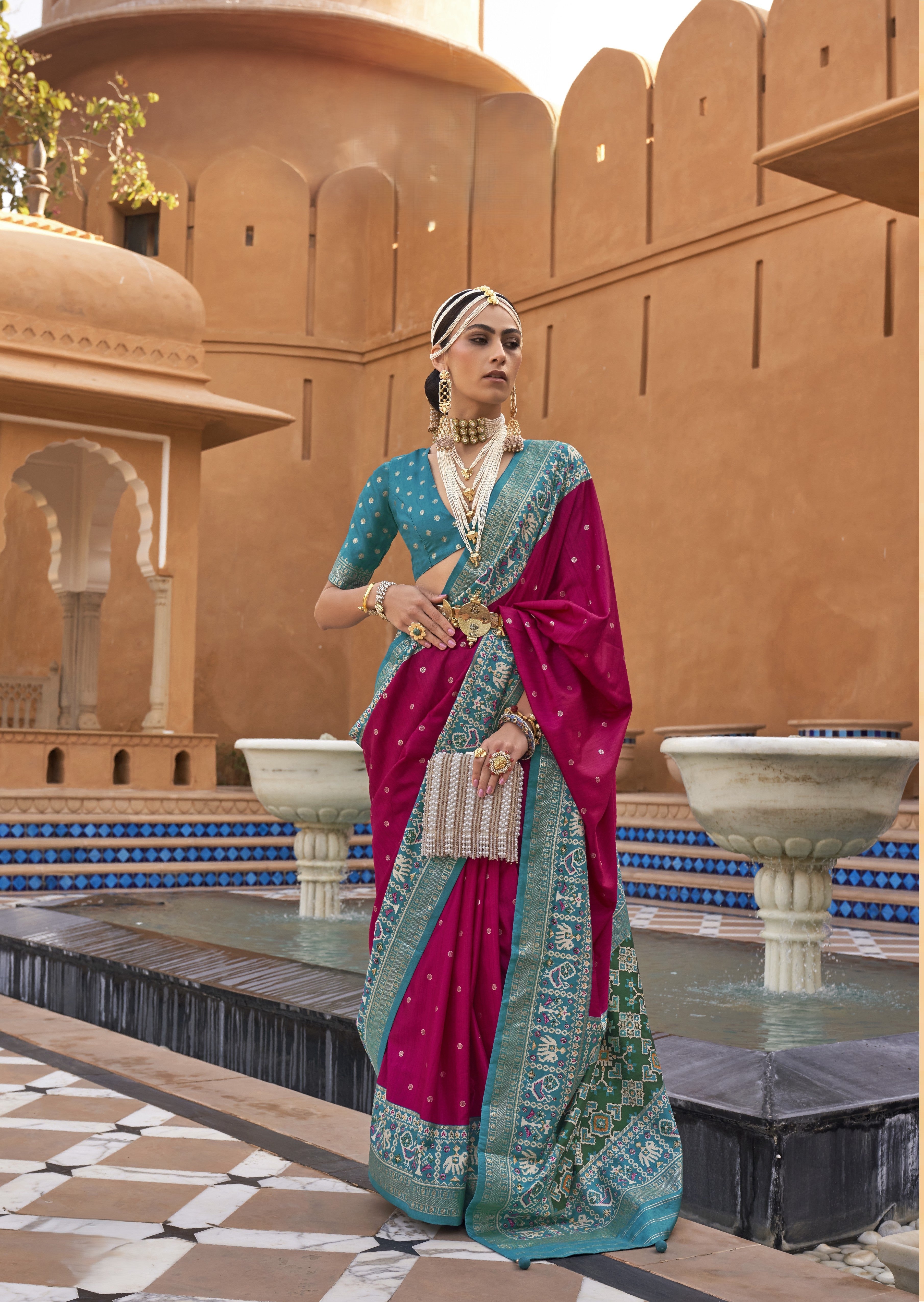 Teal Silk Saree With Patola Border