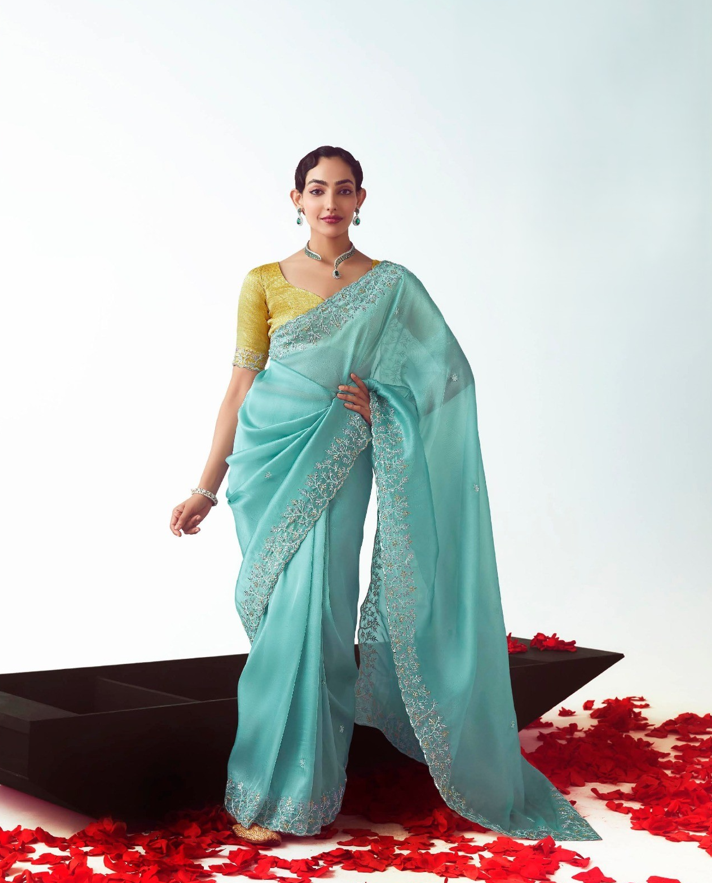 Aqua Blue Fancy Saree With Yellow Blouse