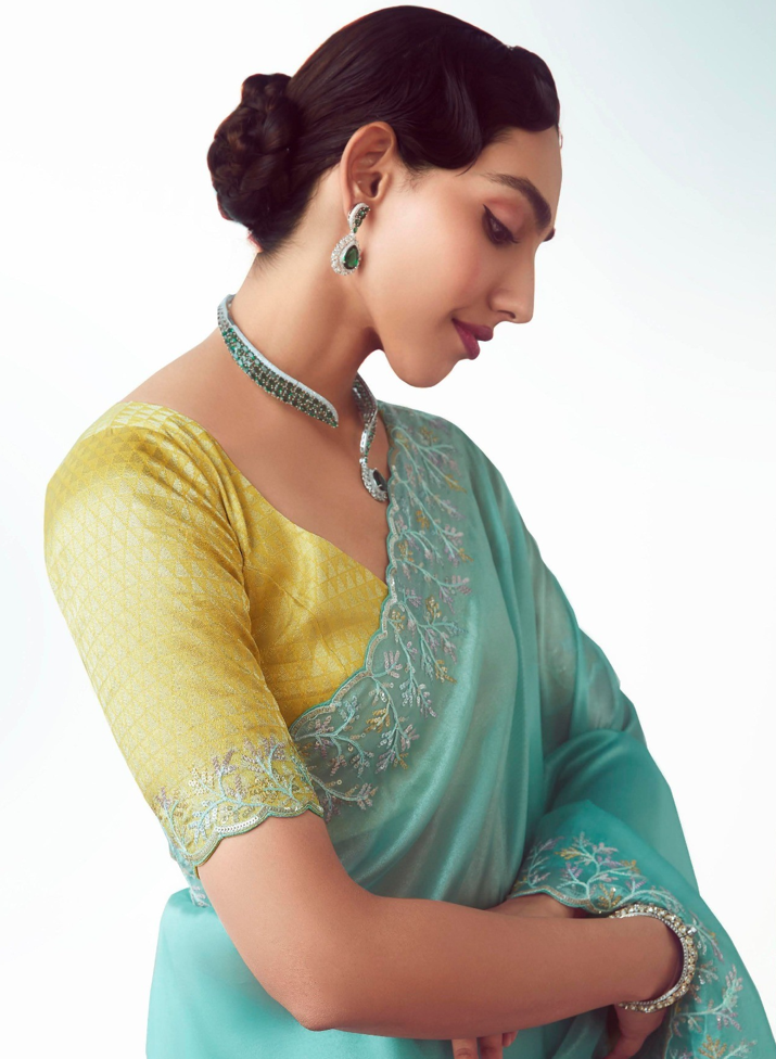 Aqua Blue Fancy Saree With Yellow Blouse
