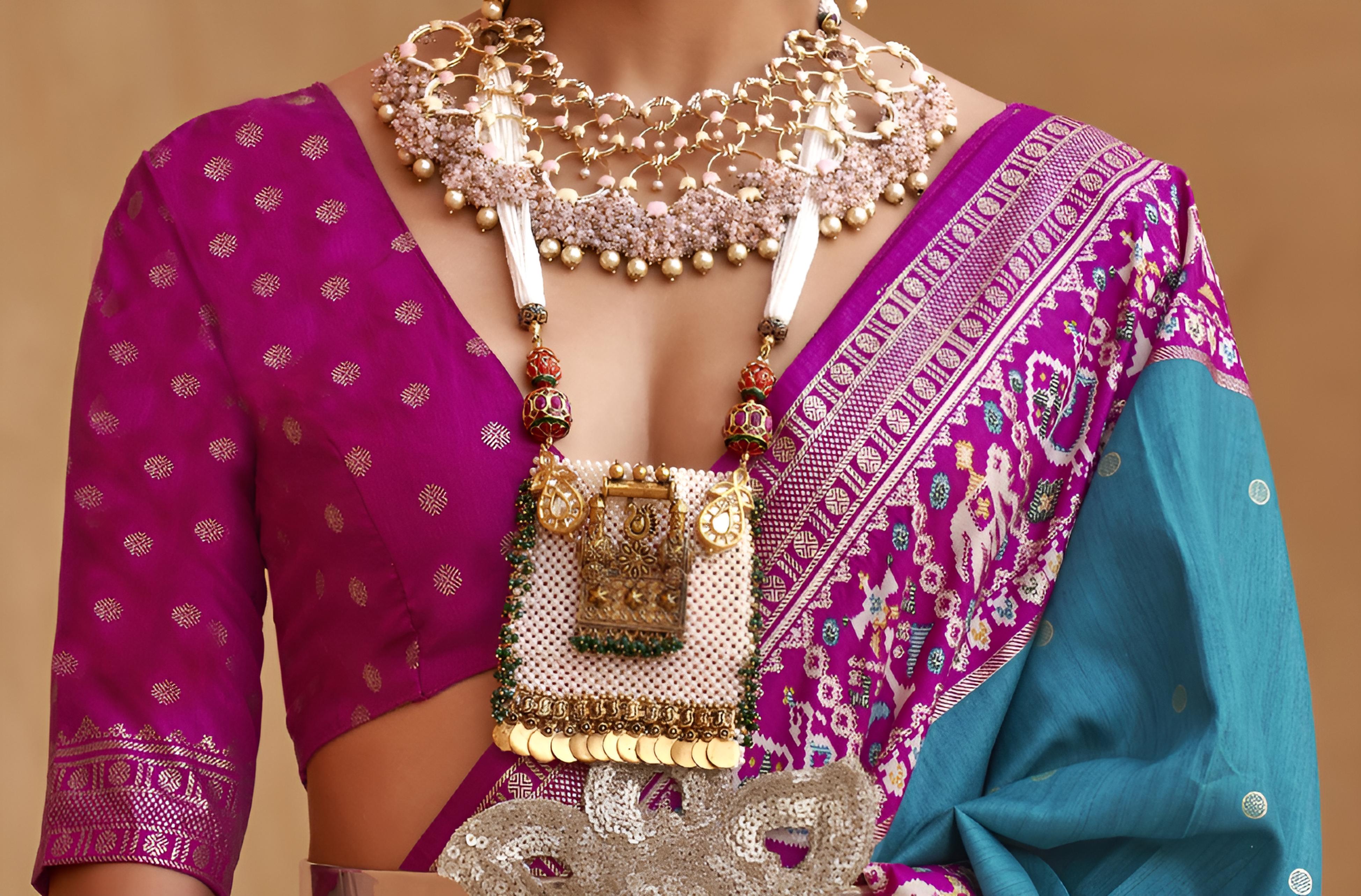 Turquoise Blue Silk Saree With Patola Border
