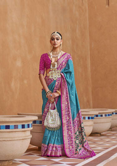 Turquoise Blue Silk Saree With Patola Border