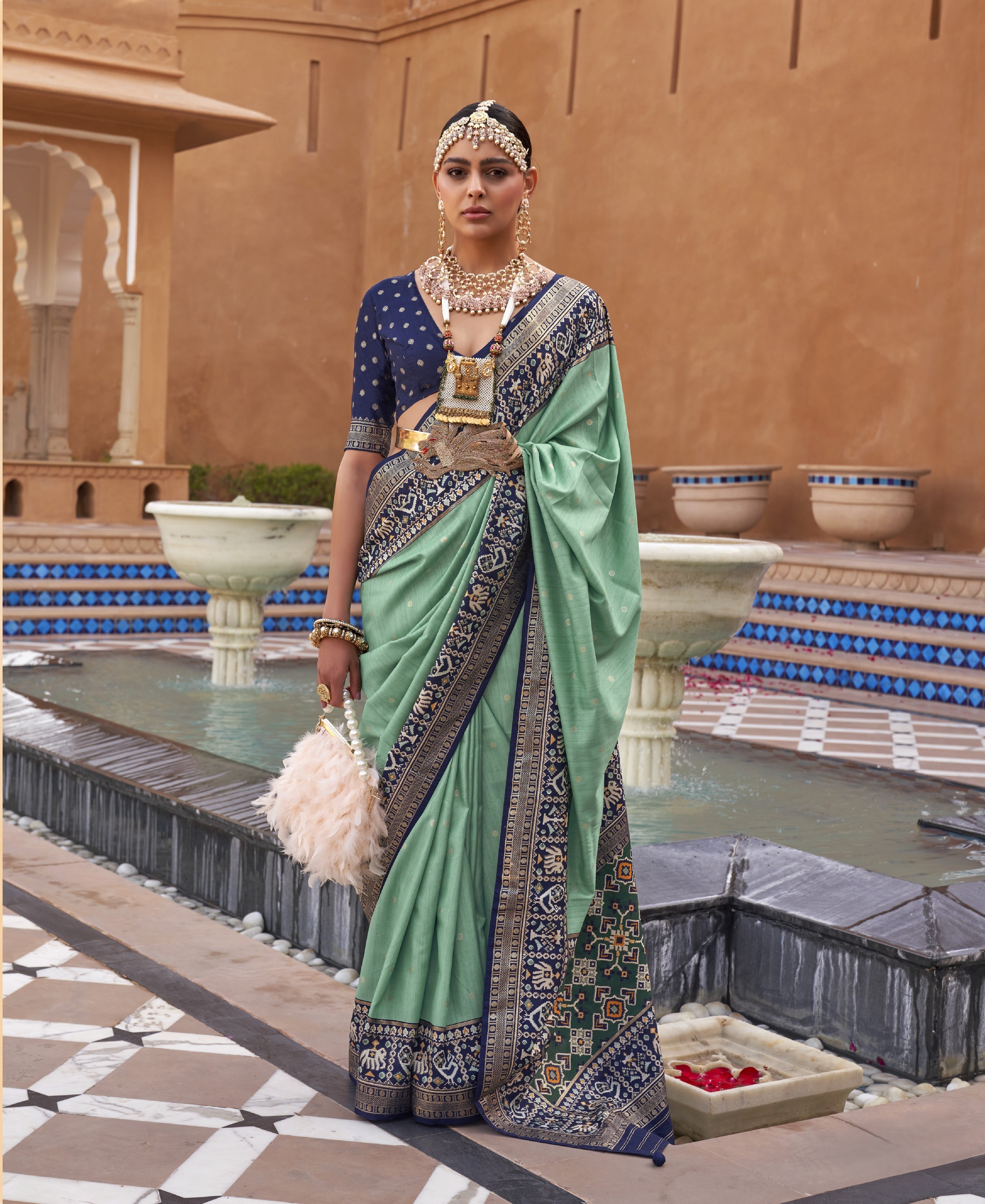 Sea Green Silk Saree With Patola Border